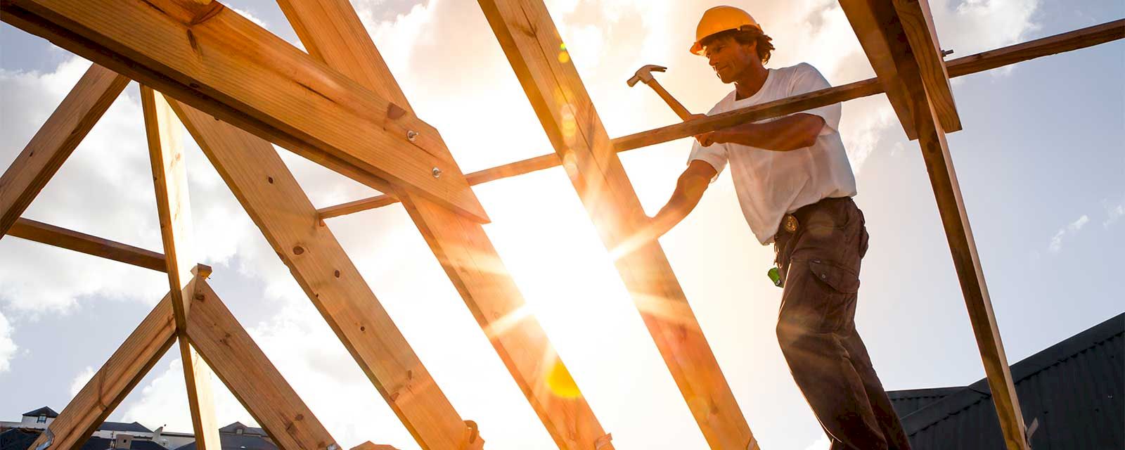 Travailler comme artisan frontalier en Suisse : permis, fiscalité et cotisations sociales